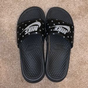 Black Nike slides